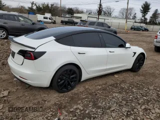 2022 Tesla Model 3 Long Range with VIN 5YJ3E1EB4NF164276, listed as a Copart auction lot 45802865 with 56,836 mi miles and Salvage Title. Bid and sale history available at DreamBid. Image 3.