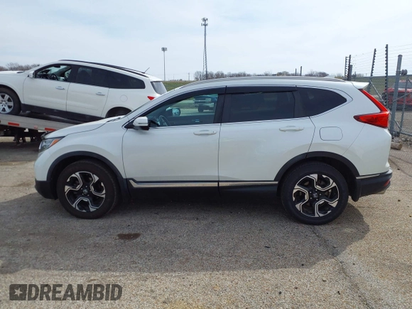 2017 Honda CR-V Touring with VIN 5J6RW2H95HL044505, listed as a IAAI auction lot 41856975 with 117,826 mi miles. Bid and sale history available at carsss.com. Image 14.