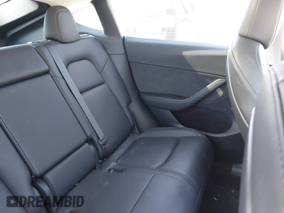 2023 Tesla Model Y Long Range with VIN 7SAYGAEE7PF971620, listed as a IAAI auction lot 41654688 with Not Provided miles and . Bid and sale history available at DreamBid. Image 8.