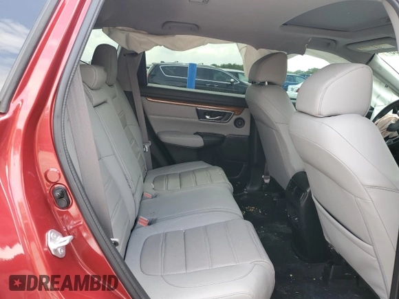 2021 Honda CR-V EX-L z VIN 7FARW1H89ME020300, wystawiony jako Copart lot #54331235 z przebiegiem Nie podano mil oraz Szkoda całkowita • Salvage title. Historia ofert i sprzedaży dostępna na DreamBid. Obrazek 11.