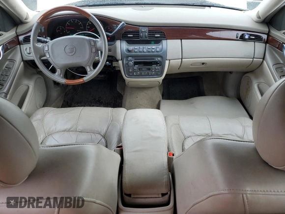 2002 Cadillac DeVille DHS z VIN 1G6KE57Y42U277428, wystawiony jako Copart lot #45757115 z przebiegiem 143 741 mil mil oraz Czysty tytuł • Clean title. Historia ofert i sprzedaży dostępna na DreamBid. Obrazek 8.