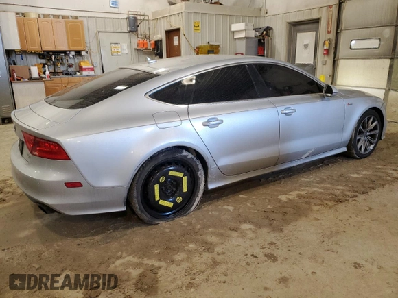 2012 Audi A7 Prestige z VIN WAUSGAFC6CN008572, wystawiony jako Copart lot #47227365 z przebiegiem 185 311 mil mil oraz Szkoda całkowita • Salvage title. Historia ofert i sprzedaży dostępna na DreamBid. Obrazek 3.