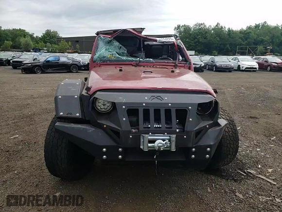 2012 Jeep Wrangler Unlimited Sport with VIN 1C4BJWDG6CL234419, listed as a Copart auction lot 62284825 with 66,649 mi miles and Salvage title. Bid and sale history available at DreamBid. Image 13.