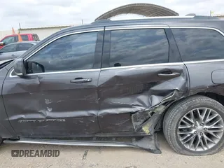 2018 Jeep Grand Cherokee Summit with VIN 1C4RJFJT2JC280973, listed as a IAAI auction lot 42083926 with 82,189 mi miles and . Bid and sale history available at DreamBid. Image 14.