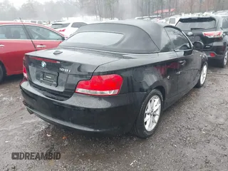 2011 BMW 1 Series 128i with VIN WBAUL7C52BVM79176, listed as a IAAI auction lot 41387249 with 99,145 mi miles and . Bid and sale history available at carsss.com. Image 4.