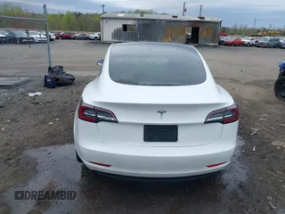 2019 Tesla Model 3 Mid Range with VIN 5YJ3E1EA5KF397098, listed as a IAAI auction lot 41943570 with 72,046 mi miles and . Bid and sale history available at DreamBid. Image 16.