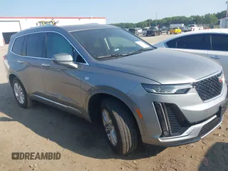 2024 Cadillac XT6 FWD Luxury with VIN 1GYKPAR42RZ723545, listed as a IAAI auction lot 42395902 with 13,992 mi miles and . Bid and sale history available at DreamBid. Image 1.