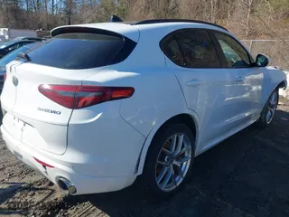 2020 Alfa Romeo Stelvio Ti with VIN ZASPAKBNXL7C91738, listed as a IAAI auction lot 41615757 with 1 mi miles. Bid and sale history available at carsss.com. Image 4.