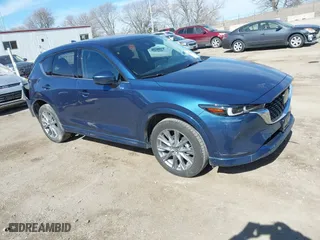 2024 Mazda CX-5 2.5 S Premium Plus Package with VIN JM3KFBEM1R0398452, listed as a IAAI auction lot 41690623 with 6,571 mi miles. Bid and sale history available at carsss.com. Image 1.