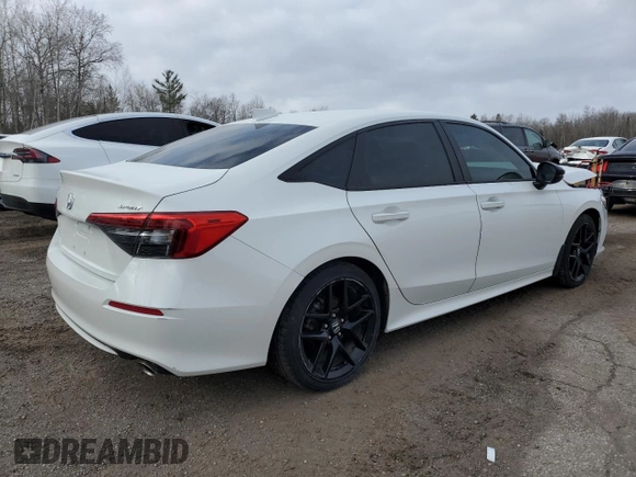 2022 Honda Civic Sport z VIN 2HGFE2F53NH119210, wystawiony jako Copart lot #51692345 z przebiegiem 58 785 mil mil oraz Szkoda całkowita • Salvage title. Historia ofert i sprzedaży dostępna na DreamBid. Obrazek 3.