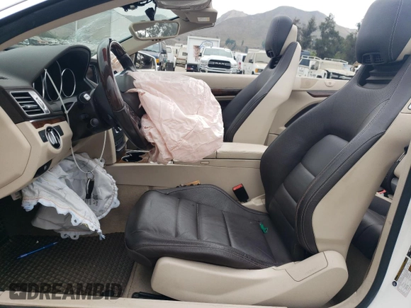 2016 Mercedes-Benz E 400 with VIN WDDKK6FF4GF350570, listed as a Copart auction lot 76563934 with 76,057 mi miles and Salvage Title. Bid and sale history available at carsss.com. Image 7.