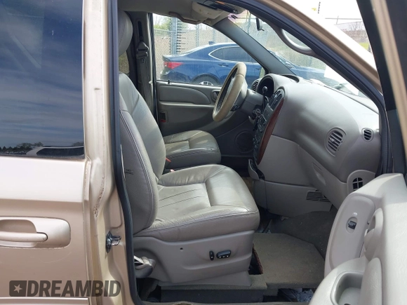 2001 Chrysler Town & Country LXi with VIN 2C8GP54L81R374793, listed as a IAAI auction lot 42150259 with 134,591 mi miles and . Bid and sale history available at DreamBid. Image 5.