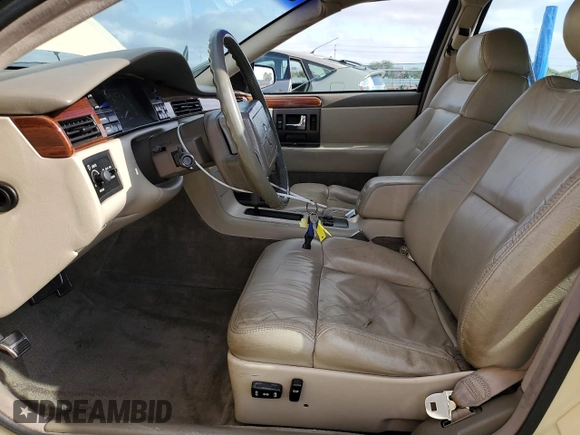 1992 Cadillac Seville z VIN 1G6KS53B0NU837105, wystawiony jako Copart lot #55865205 z przebiegiem 94 740 mil mil oraz Szkody całkowita. Historia ofert i sprzedaży dostępna na DreamBid. Obrazek 7.