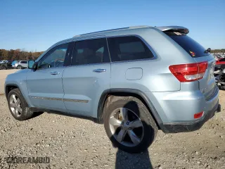 2012 Jeep Grand Cherokee Overland with VIN 1C4RJFCG6CC239104, listed as a Copart auction lot 83635184 with 166,167 mi miles and Clean Title. Bid and sale history available at carsss.com. Image 2.