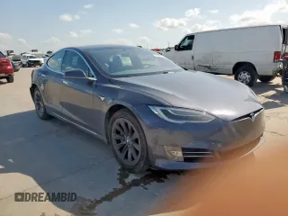 2018 Tesla Model S 75D с VIN 5YJSA1E21JF260383, выставлен на аукционе Copart как лот 61927665 с пробегом 74 644 миль миль и Списание • Salvage title. История ставок и продаж доступна на DreamBid. Изображение 4.