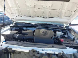 2023 Toyota Tacoma SR z VIN 3TYCZ5AN5PT151681, wystawiony jako IAAI lot #41936577 z przebiegiem 30 056 mil mil oraz . Historia ofert i sprzedaży dostępna na DreamBid. Obrazek 10.