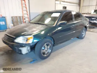 2002 Honda Civic LX with VIN 2HGES16612H595748, listed as a IAAI auction lot 41356181 with 299,899 mi miles. Bid and sale history available at carsss.com. Image 2.