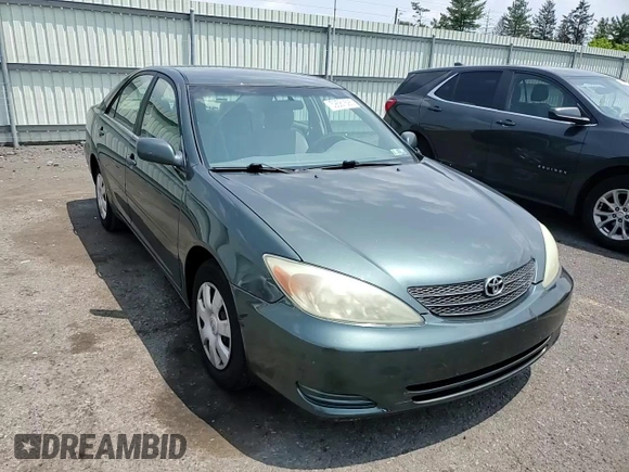 2004 Toyota Camry LE z VIN 4T1BE32K34U294224, wystawiony jako Copart lot #59581595 z przebiegiem 188 034 mil mil oraz Szkoda całkowita • Salvage title. Historia ofert i sprzedaży dostępna na DreamBid. Obrazek 13.