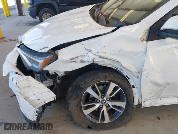 2018 Toyota RAV4 XLE with VIN JTMRFREVXJD240388, listed as a IAAI auction lot 42052065 with 117,114 mi miles. Bid and sale history available at carsss.com. Image 6.