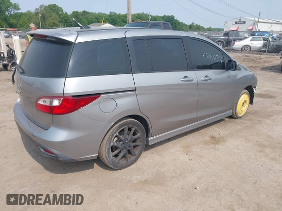 2012 Mazda 5 Touring с VIN JM1CW2CL1C0107706, выставлен на аукционе IAAI как лот 42422759 с пробегом 123 475 миль миль и . История ставок и продаж доступна на DreamBid. Изображение 4.