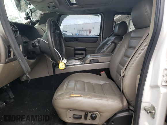 2003 Hummer H2 with VIN 5GRGN23U43H128269, listed as a Copart auction lot 47992444 with 153,360 mi miles and Salvage Title. Bid and sale history available at carsss.com. Image 7.