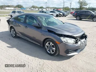 2017 Honda Civic LX z VIN 19XFC2F51HE036153, wystawiony jako IAAI lot #41546498 z przebiegiem 78 726 mil mil oraz . Historia ofert i sprzedaży dostępna na DreamBid. Obrazek 1.