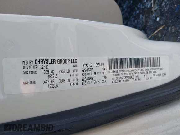 2012 Dodge Grand Caravan SXT with VIN 2C4RDGCG9CR200432, listed as a IAAI auction lot 42027477 with 99,076 mi miles and . Bid and sale history available at DreamBid. Image 9.