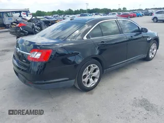 2012 Ford Taurus SEL with VIN 1FAHP2EW8CG113879, listed as a IAAI auction lot 42004495 with 194,952 mi miles and . Bid and sale history available at DreamBid. Image 4.