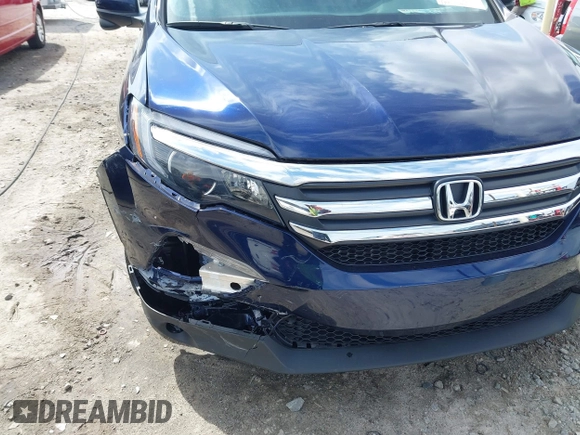 2018 Honda Pilot EX-L with VIN 5FNYF5H5XJB025960, listed as a IAAI auction lot 41843520 with 23,404 mi miles and . Bid and sale history available at DreamBid. Image 17.