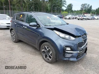2021 Kia Sportage EX with VIN KNDPN3AC1M7921232, listed as a IAAI auction lot 42519851 with 26,104 mi miles and . Bid and sale history available at DreamBid. Image 1.