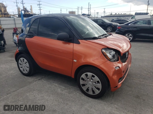 2016 Smart fortwo Passion z VIN WMEFJ5DAXGK069026, wystawiony jako Copart lot #53535045 z przebiegiem 34 410 mil mil oraz Tytuł czysty. Historia ofert i sprzedaży dostępna na DreamBid. Obrazek 4.