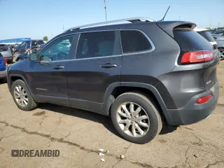 2014 Jeep Cherokee Limited with VIN 1C4PJMDB2EW215897, listed as a Copart auction lot 59576765 with 107,071 mi miles and Salvage title. Bid and sale history available at DreamBid. Image 2.