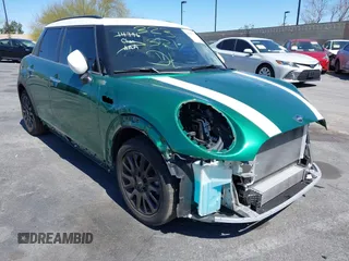 2024 MINI Hardtop 4 Door Cooper Classic with VIN WMW33DK03R2V30440, listed as a IAAI auction lot 41403552 with 11,656 mi miles and . Bid and sale history available at DreamBid. Image 1.