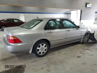 2002 Acura RL z VIN JH4KA96542C007840, wystawiony jako Copart lot #53459615 z przebiegiem Nie podano mil oraz Szkoda całkowita • Salvage title. Historia ofert i sprzedaży dostępna na DreamBid. Obrazek 3.