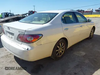 2004 Lexus ES 330 with VIN JTHBA30G645028767, listed as a IAAI auction lot 42150538 with 163,449 mi miles. Bid and sale history available at carsss.com. Image 4.