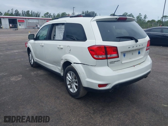 2017 Dodge Journey SXT with VIN 3C4PDDBG3HT592061, listed as a IAAI auction lot 38299155 with 127,856 mi miles and . Bid and sale history available at DreamBid. Image 3.