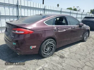 2017 Ford Fusion Titanium z VIN 3FA6P0SU8HR313773, wystawiony jako Copart lot #58791695 z przebiegiem 141 777 mil mil oraz Czysty tytuł • Clean title. Historia ofert i sprzedaży dostępna na DreamBid. Obrazek 3.