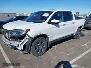 2020 Honda Ridgeline RTL-E with VIN 5FPYK3F76LB005008, listed as a IAAI auction lot 41662580 with 33,987 mi miles. Bid and sale history available at carsss.com. Image 19.