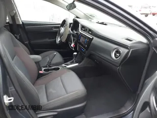 2018 Toyota Corolla L z VIN 5YFBURHE7JP831763, wystawiony jako IAAI lot #41539485 z przebiegiem 95 495 mil mil oraz . Historia ofert i sprzedaży dostępna na DreamBid. Obrazek 5.