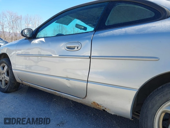 2001 Ford Escort ZX2 with VIN 3FAFP11321R241862, listed as a IAAI auction lot 41875706 with 284,720 mi miles. Bid and sale history available at carsss.com. Image 12.