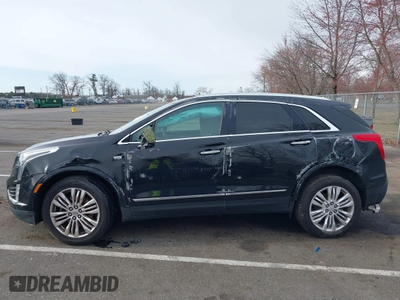 2018 Cadillac XT5 Premium Luxury FWD with VIN 1GYKNERS4JZ198830, listed as a IAAI auction lot 41887088 with 91,515 mi miles. Bid and sale history available at carsss.com. Image 14.