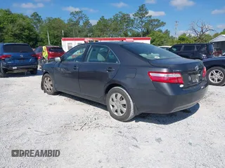 2009 Toyota Camry with VIN 4T1BE46KX9U879566, listed as a IAAI auction lot 42020660 with 207,291 mi miles. Bid and sale history available at carsss.com. Image 3.
