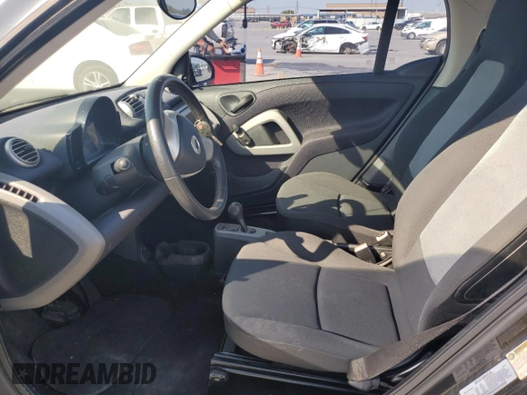 2012 Smart fortwo Pure z VIN WMEEJ3BA5CK540092, wystawiony jako Copart lot #75701964 z przebiegiem 59 355 mil mil oraz Szkody całkowita. Historia ofert i sprzedaży dostępna na DreamBid. Obrazek 7.