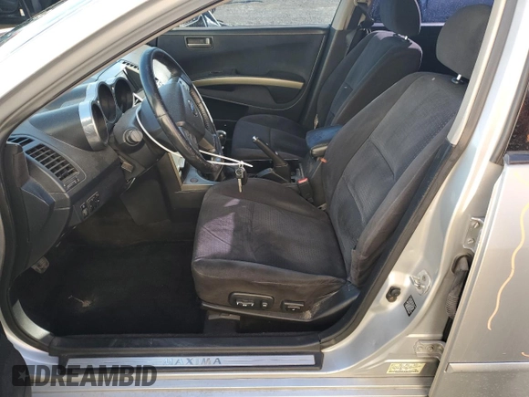 2004 Nissan Maxima SE with VIN 1N4BA41E44C844009, listed as a Copart auction lot 77887584 with 252,152 mi miles and Salvage Title. Bid and sale history available at DreamBid. Image 7.