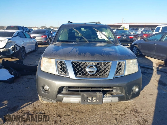 2008 Nissan Pathfinder S with VIN 5N1AR18U58C636801, listed as a IAAI auction lot 41390205 with 208,659 mi miles. Bid and sale history available at carsss.com. Image 12.