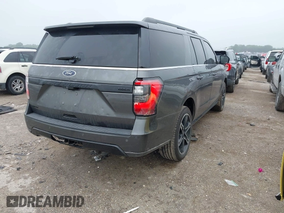 2021 Ford Expedition Max Limited with VIN 1FMJK1KTXMEA33099, listed as a IAAI auction lot 42155357 with 58,293 mi miles and . Bid and sale history available at DreamBid. Image 4.