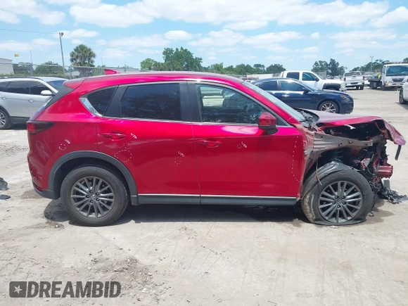 2019 Mazda CX-5 Touring with VIN JM3KFACM6K1549234, listed as a IAAI auction lot 42036633 with 85,065 mi miles and . Bid and sale history available at carsss.com. Image 14.