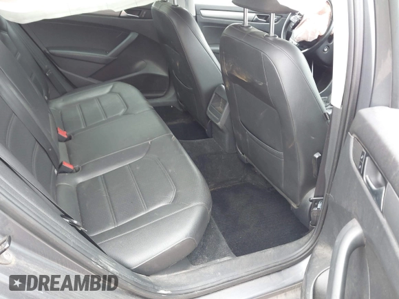 2014 Volkswagen Passat Wolfsburg Edition with VIN 1VWAT7A37EC102282, listed as a IAAI auction lot 42310561 with 113,374 mi miles and . Bid and sale history available at DreamBid. Image 8.