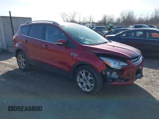 2015 Ford Escape Titanium with VIN 1FMCU9J9XFUC75357, listed as a IAAI auction lot 41705474 with 198,381 mi miles and . Bid and sale history available at DreamBid. Image 1.