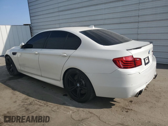 2014 BMW M5 with VIN WBSFV9C54ED097462, listed as a Copart auction lot 70482504 with 76,501 mi miles and Clean Title. Bid and sale history available at carsss.com. Image 2.